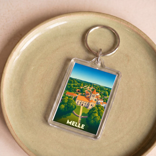 Porte-clés souvenir de la ville de Melle avec une illustration stylisée.