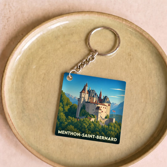 Porte-clés souvenir de la ville de Menthon-Saint-Bernard avec une illustration stylisée de son château.