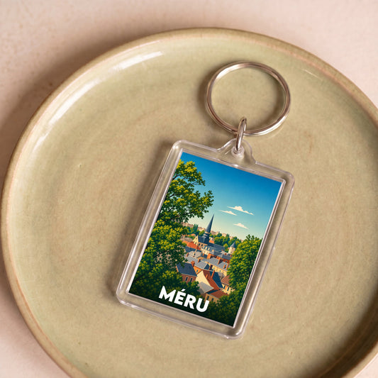 Porte-clés souvenir de la ville de Méru avec une illustration stylisée.