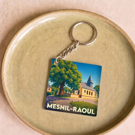 Porte-clés souvenir de la ville de Mesnil-Raoul avec une illustration stylisée.