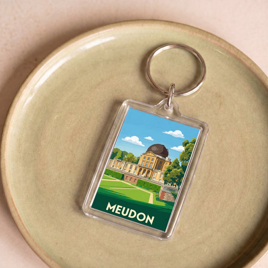 Porte-clés souvenir de la ville de Meudon avec une illustration stylisée de l'observatoire.