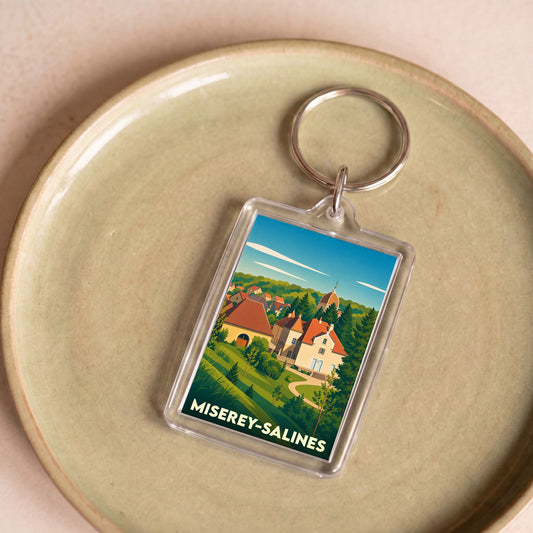 Porte-clés souvenir de la ville de Miserey-Salines avec une illustration stylisée.