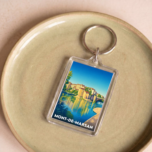 Porte-clés souvenir de la ville de Mont-de-Marsan avec une illustration stylisée.