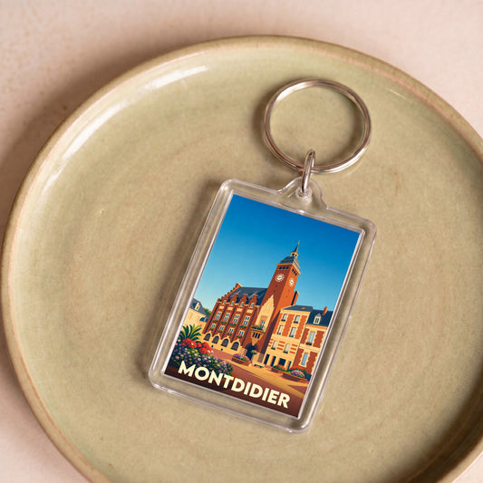 Porte-clés souvenir de la ville de Montdidier avec une illustration stylisée de son hôtel de ville.