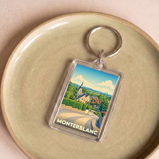 Porte-clés souvenir de la ville de Monterblanc avec une illustration stylisée.