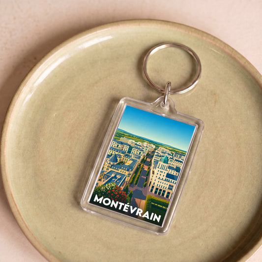 Porte-clés souvenir de la ville de Montévrain avec une illustration stylisée.