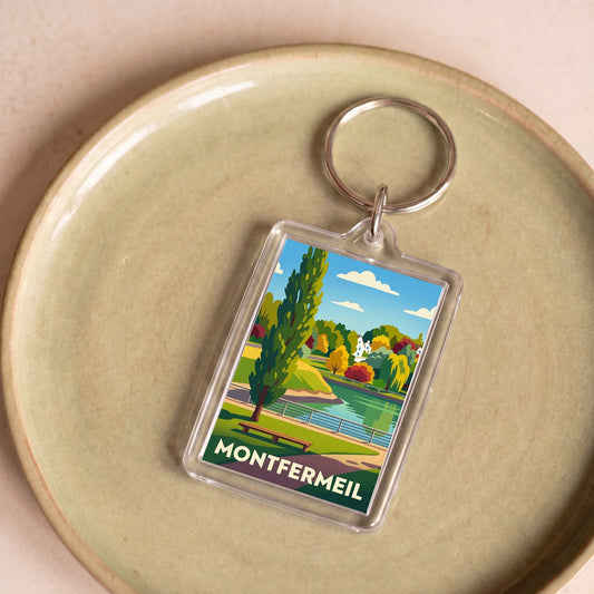 Porte-clés souvenir de la ville de Montfermeil avec une illustration stylisée.