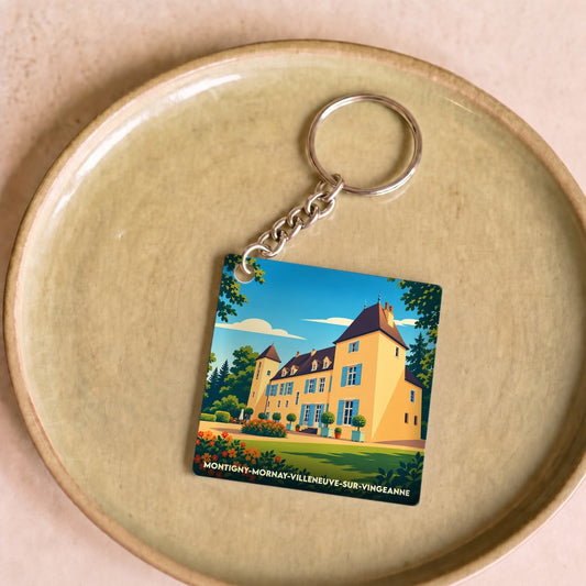 Porte-clés souvenir de la ville de Montigny-Mornay-Villeneuve-sur-Vingeanne avec une illustration stylisée de son château.