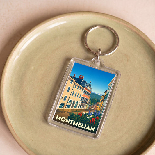 Porte-clés souvenir de la ville de Montmélian avec une illustration stylisée.