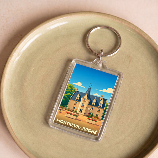 Porte-clés souvenir de la ville de Montreuil-Juigné avec une illustration stylisée de l'hôtel de ville.