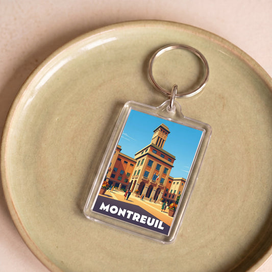 Porte-clés souvenir de la ville de Montreuil avec une illustration stylisée.