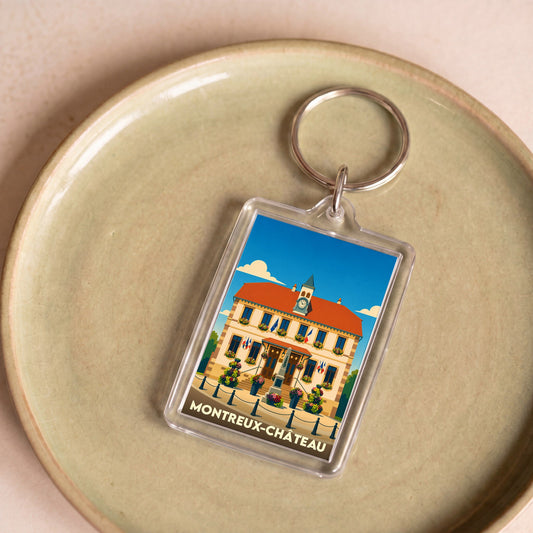 Porte-clés souvenir de la ville de Montreux-Château avec une illustration stylisée de sa mairie.