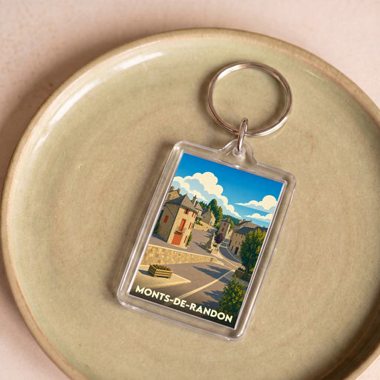 Porte-clés souvenir de la ville de Monts-de-Randon avec une illustration stylisée.