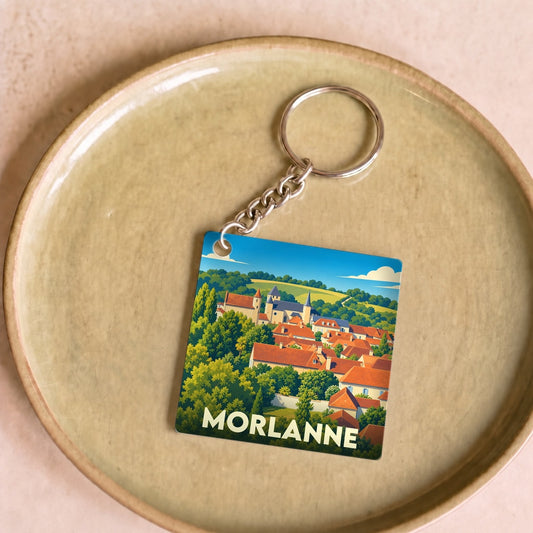 Porte-clés souvenir de la ville de Morlanne avec une illustration stylisée.