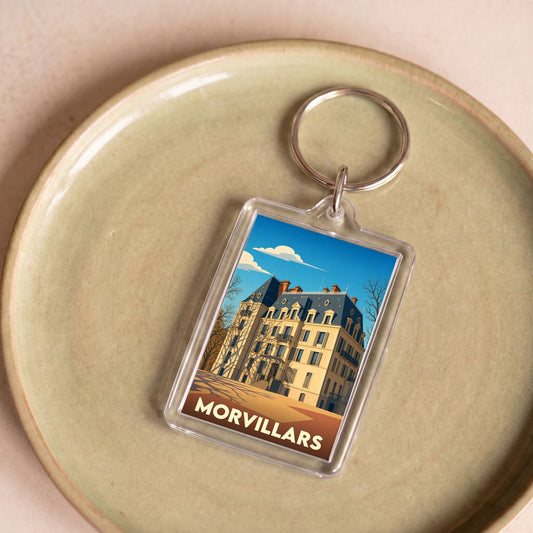 Porte-clés souvenir de la ville de Morvillars avec une illustration stylisée d'un château.