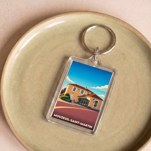 Porte-clés souvenir de la ville de Mouzeuil-Saint-Martin avec une illustration stylisée.