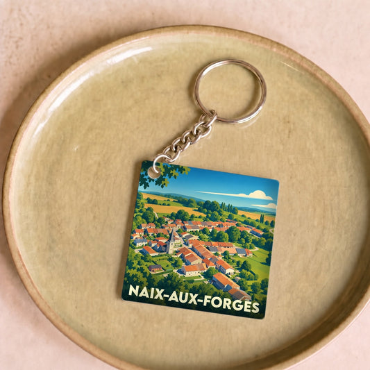 Porte-clés souvenir de la ville de Naix-aux-Forges avec une illustration stylisée.