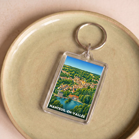 Porte-clés souvenir de la ville de Nanteuil-en-Vallée avec une illustration stylisée.