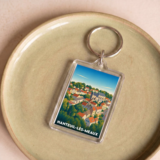 Porte-clés souvenir de la ville de Nanteuil-lès-Meaux avec une illustration stylisée.