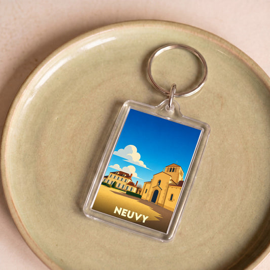 Porte-clés souvenir de la ville de Neuvy avec une illustration stylisée.