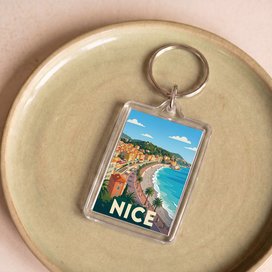 Porte-clés souvenir de la ville de Nice orné d'une illustration stylisée de son front de mer.