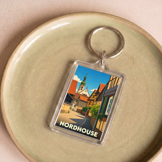 Porte-clés souvenir de la ville de Nordhouse avec une illustration stylisée.