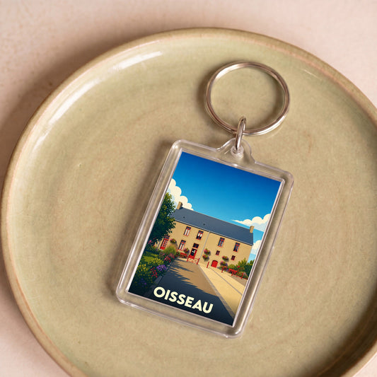 Porte-clés souvenir de la ville de Oisseau avec une illustration stylisée.