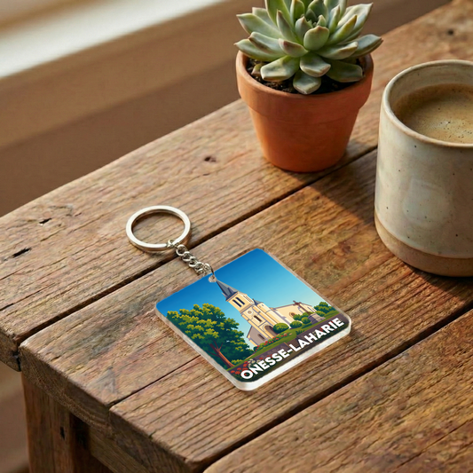 Porte-clés souvenir de la ville de Onesse-Laharie avec une illustration stylisée.