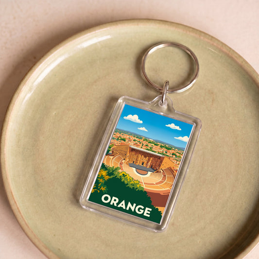 Porte-clés souvenir de la ville de Orange avec une illustration stylisée.