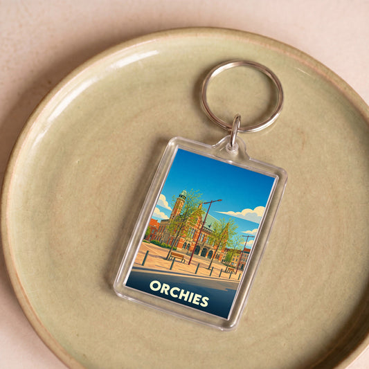 Porte-clés souvenir de la ville d'Orchies avec une illustration stylisée de son hôtel de ville.