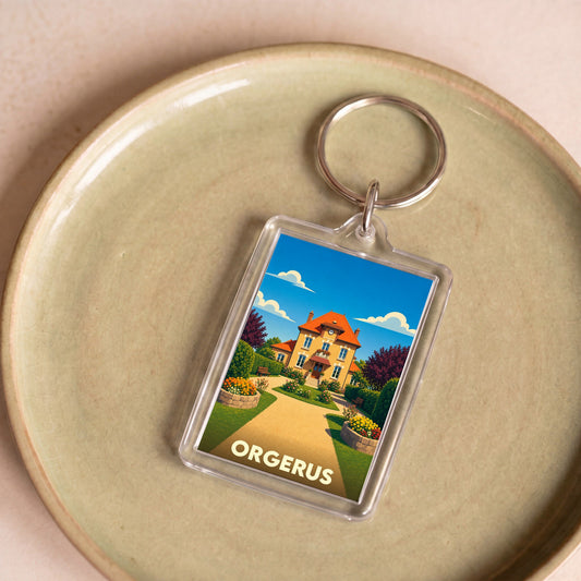 Porte-clés souvenir de la ville d'Orgerus avec une illustration stylisée de sa mairie.