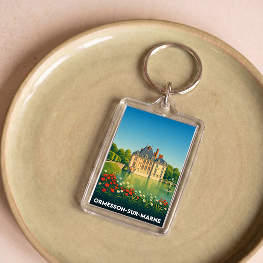Porte-clés souvenir de la ville d'Ormesson-sur-Marne avec une illustration stylisée de son château.