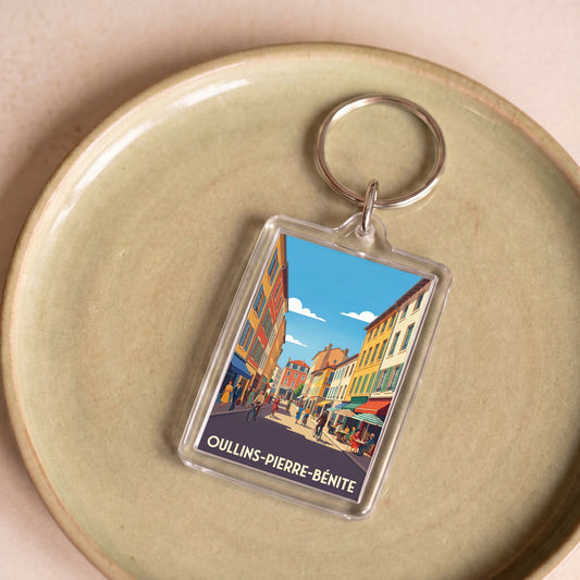Porte-clés souvenir de la ville d'Oullins-Pierre-Bénite avec une illustration graphique colorée.