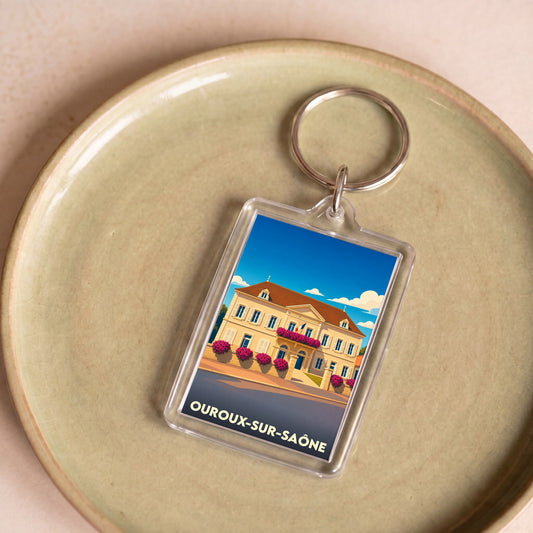 Porte-clés souvenir de la ville de Ouroux-sur-Saône avec une illustration stylisée de sa mairie.