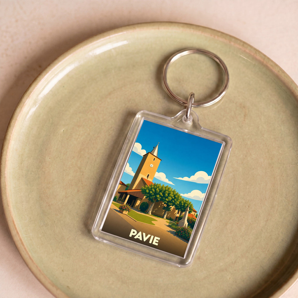Porte-clés souvenir de la ville de Pavie avec une illustration stylisée de son église.
