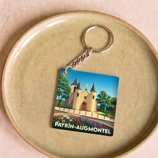 Porte-clés souvenir de la ville de Payrin-Augmontel avec une illustration stylisée de son église.