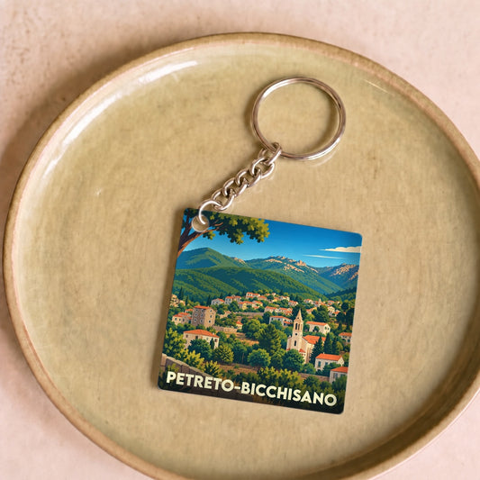 Porte-clés souvenir de la ville de Petreto-Bicchisano avec une illustration stylisée.
