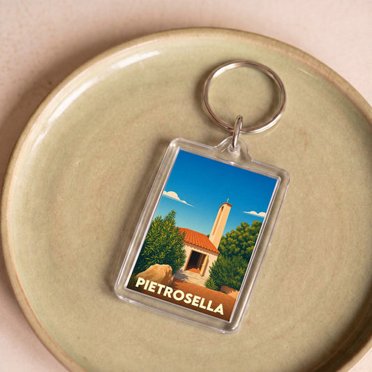 Porte-clés souvenir de la ville de Pietrosella avec une illustration stylisée.