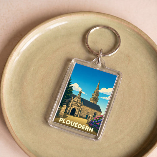Porte-clés souvenir de la ville de Plouédern avec une illustration stylisée de son église.