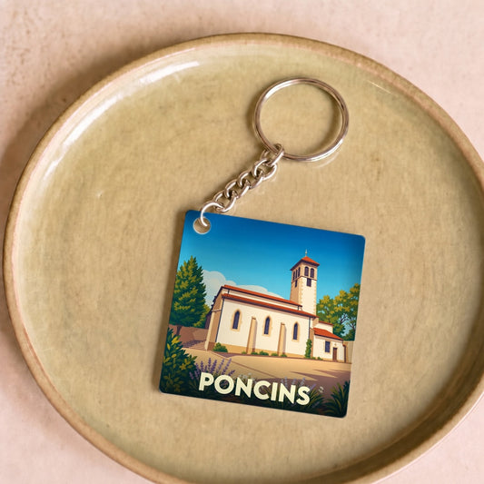 Porte-clés souvenir de la ville de Poncins avec une illustration stylisée de son église.