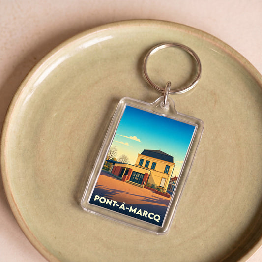 Porte-clés souvenir de la ville de Pont-à-Marcq avec une illustration stylisée de sa mairie.