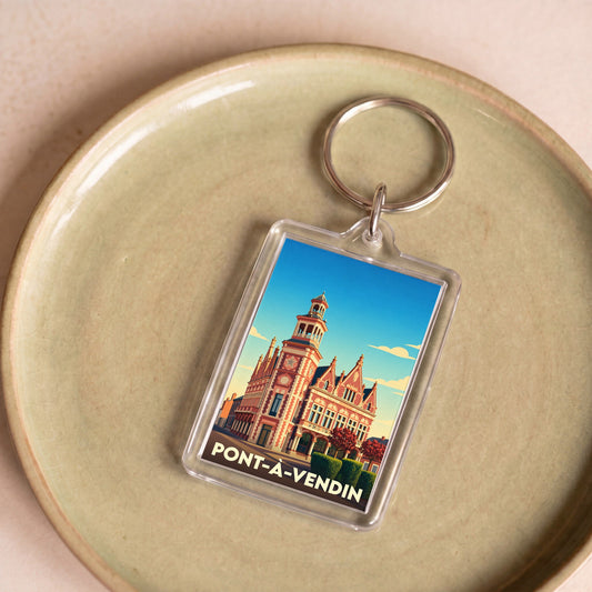 Porte-clés souvenir de la ville de Pont-à-Vendin avec une illustration stylisée de son hôtel de ville.