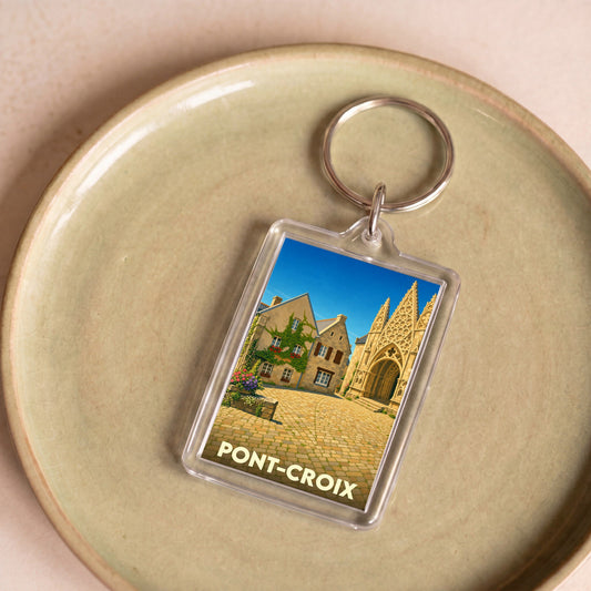Porte-clés souvenir de la ville de Pont-Croix avec une illustration stylisée.