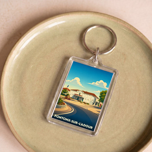 Porte-clés souvenir de la ville de Pontonx-sur-l'Adour avec une illustration stylisée.