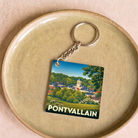 Porte-clés souvenir de la ville de Pontvallain avec une illustration stylisée.