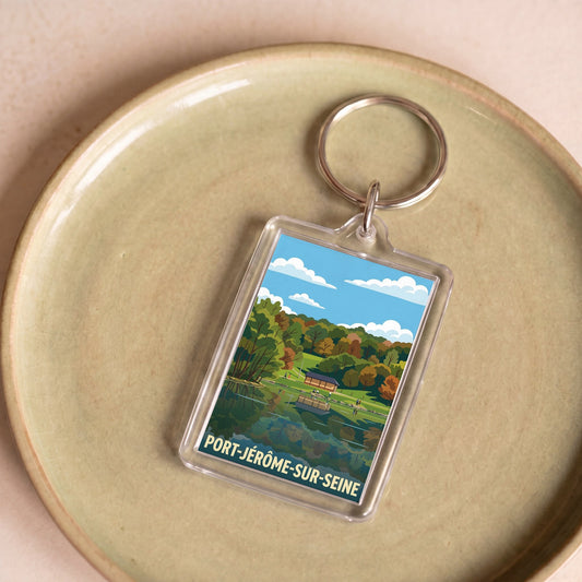 Porte-clés souvenir de la ville de Port-Jérôme-sur-Seine avec une illustration paysagère stylisée.