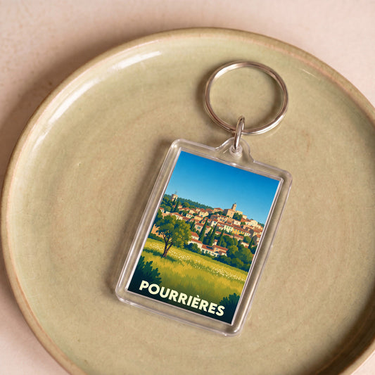 Porte-clés souvenir de la ville de Pourrières avec une illustration stylisée.