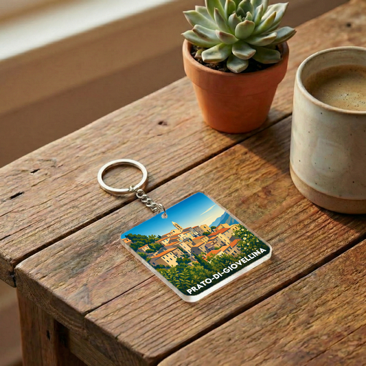 Porte-clés souvenir de la ville de Prato-di-Giovellina avec une illustration stylisée du village.