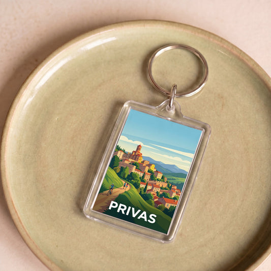 Porte-clés souvenir de la ville de Privas avec une illustration stylisée de son paysage urbain.