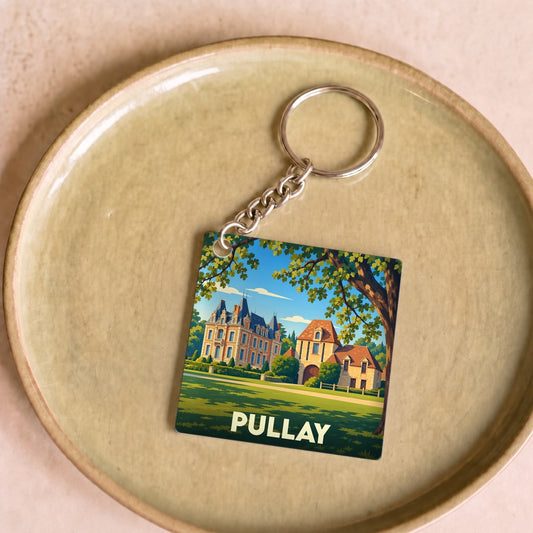 Porte-clés souvenir de la ville de Pullay illustré par un dessin stylisé de son château.